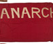 A flag with the word 'Anarchy' stiched in white. A flag with the word 'Anarchy' stiched in white.