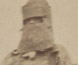 Photograph of a policeman wearing pieces of the Kelly armour. Photograph of a policeman wearing pieces of the Kelly armour.