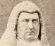 Portrait photograph of Redmond Barry wearing judge's wig and robes. Portrait photograph of Redmond Barry wearing judge's wig and robes.