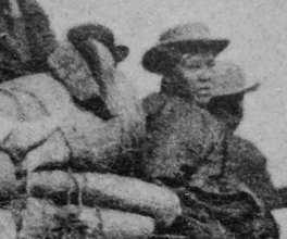 Photograph of a heavily loaded coach. Photograph of a heavily loaded coach.